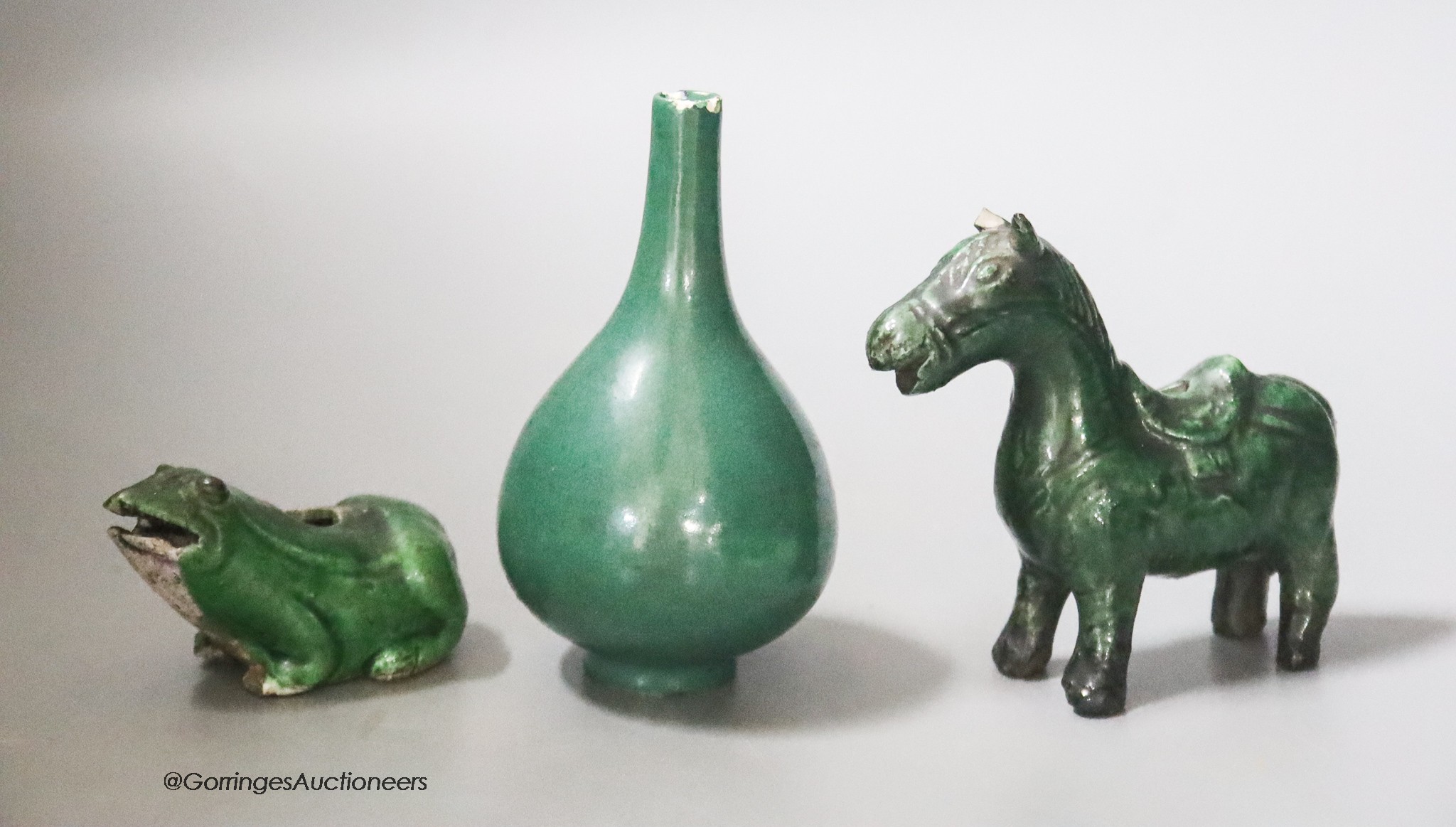 A Chinese green glazed miniature vase, 10cm, two green glazed water droppers in the form of a horse and a frog